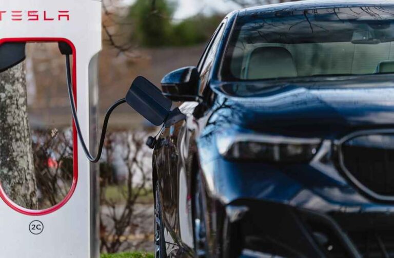 BMW Expands EV Charging with Tesla’s Supercharger Network Access BMW EVs Charging at Tesla Superchargers